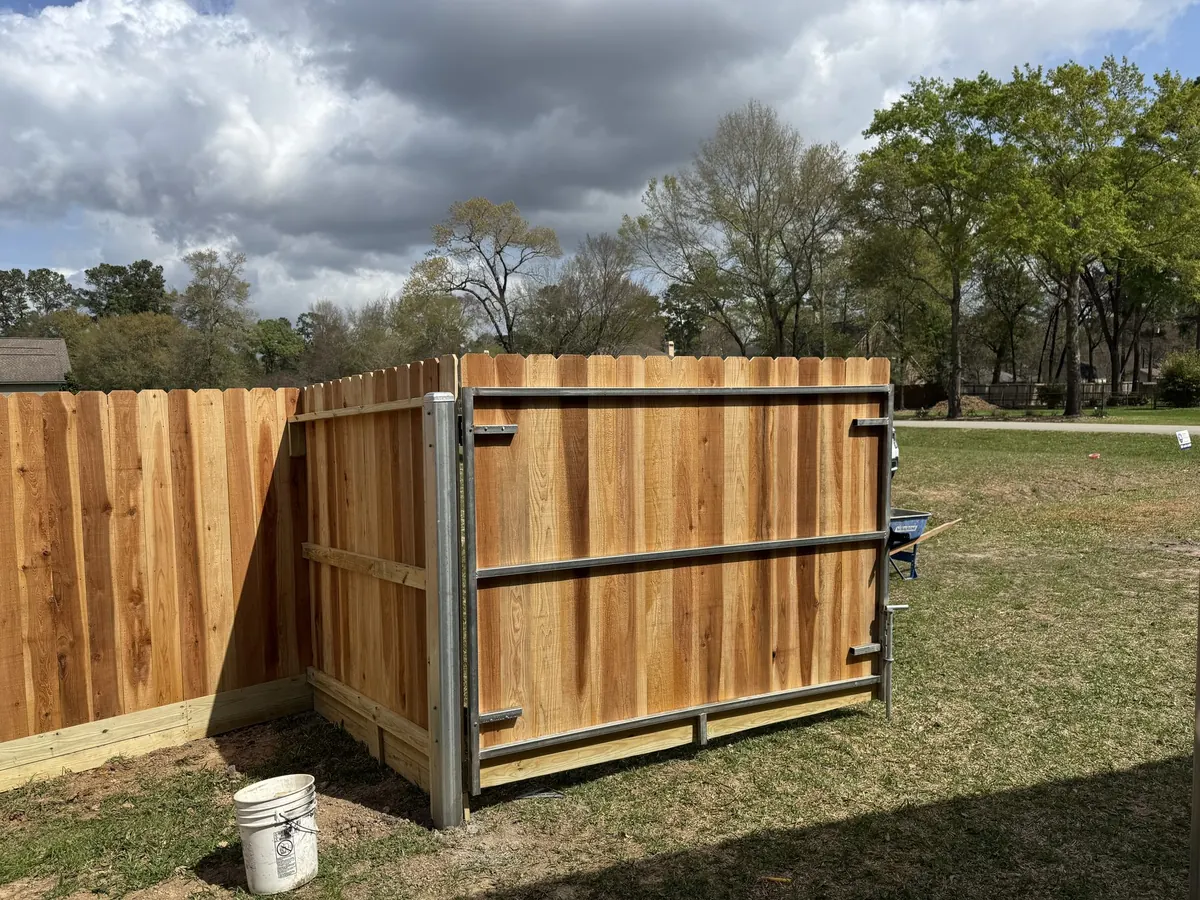 Cedar gate built on a steel frame in Sugar Land